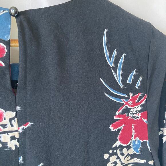 Now| Girls black floral flared long sleeve dress - Picture 8 of 10